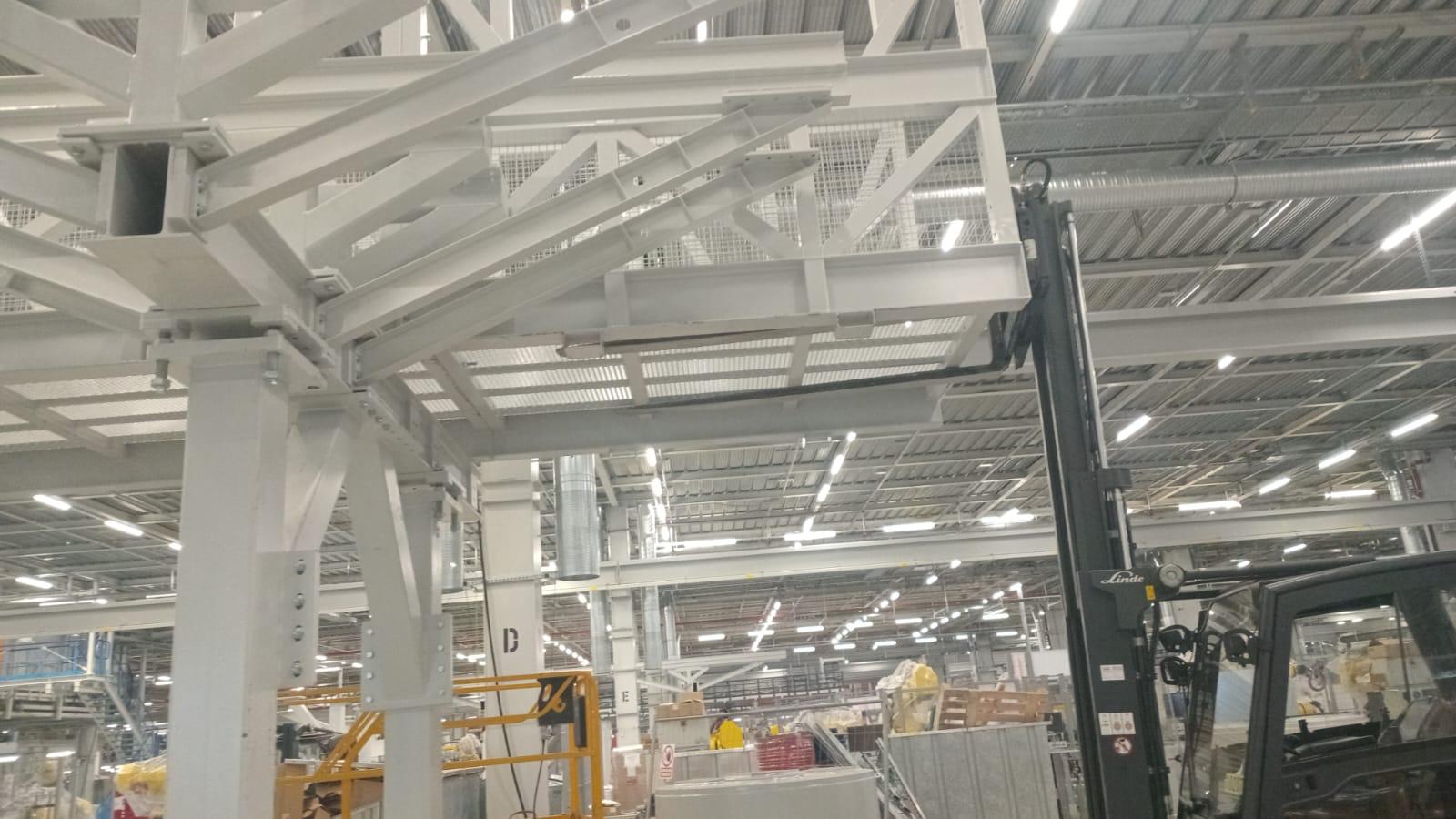 Industrial steel structure installation inside production plant