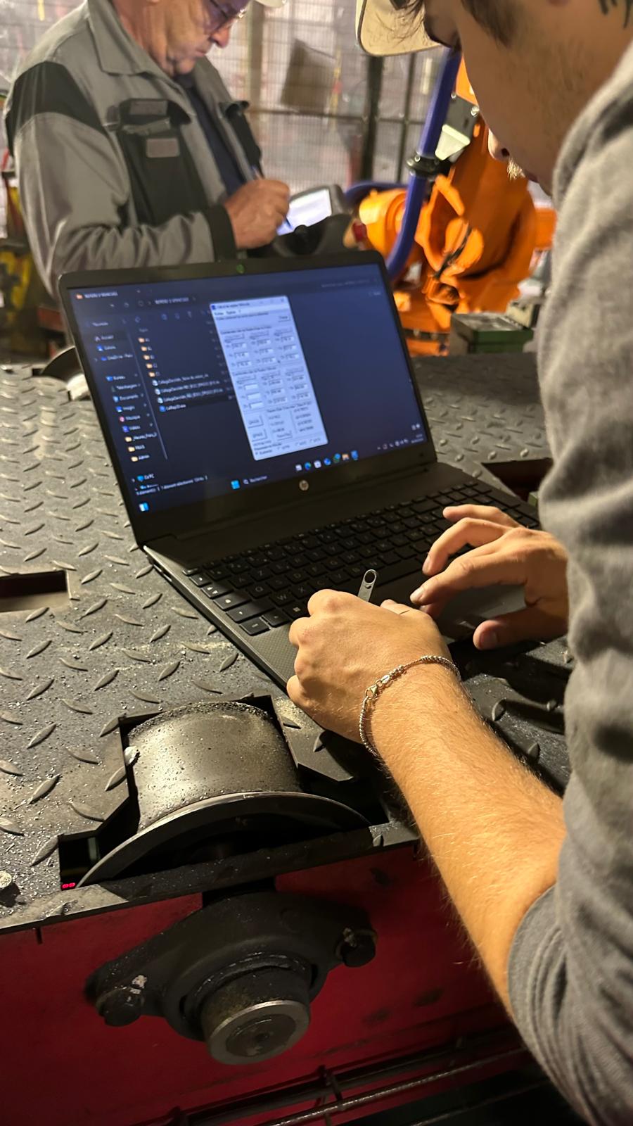 Laptop-based adjustment work on industrial robot system